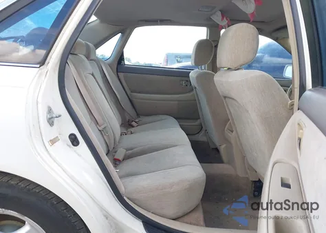 2000 Toyota Avalon Xl z USA, uszkodzony, nr VIN 4T1BF28B9YU094498